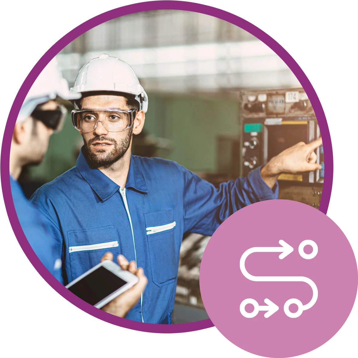 Two workers installing OT software in an industrial environment beside an icon showing arrows and circles.